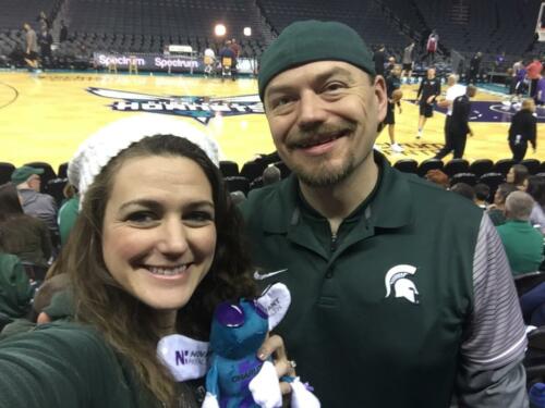 Kristen & John Schils MSU at the Charlotte Hornets Basketball Game with Miles Davis